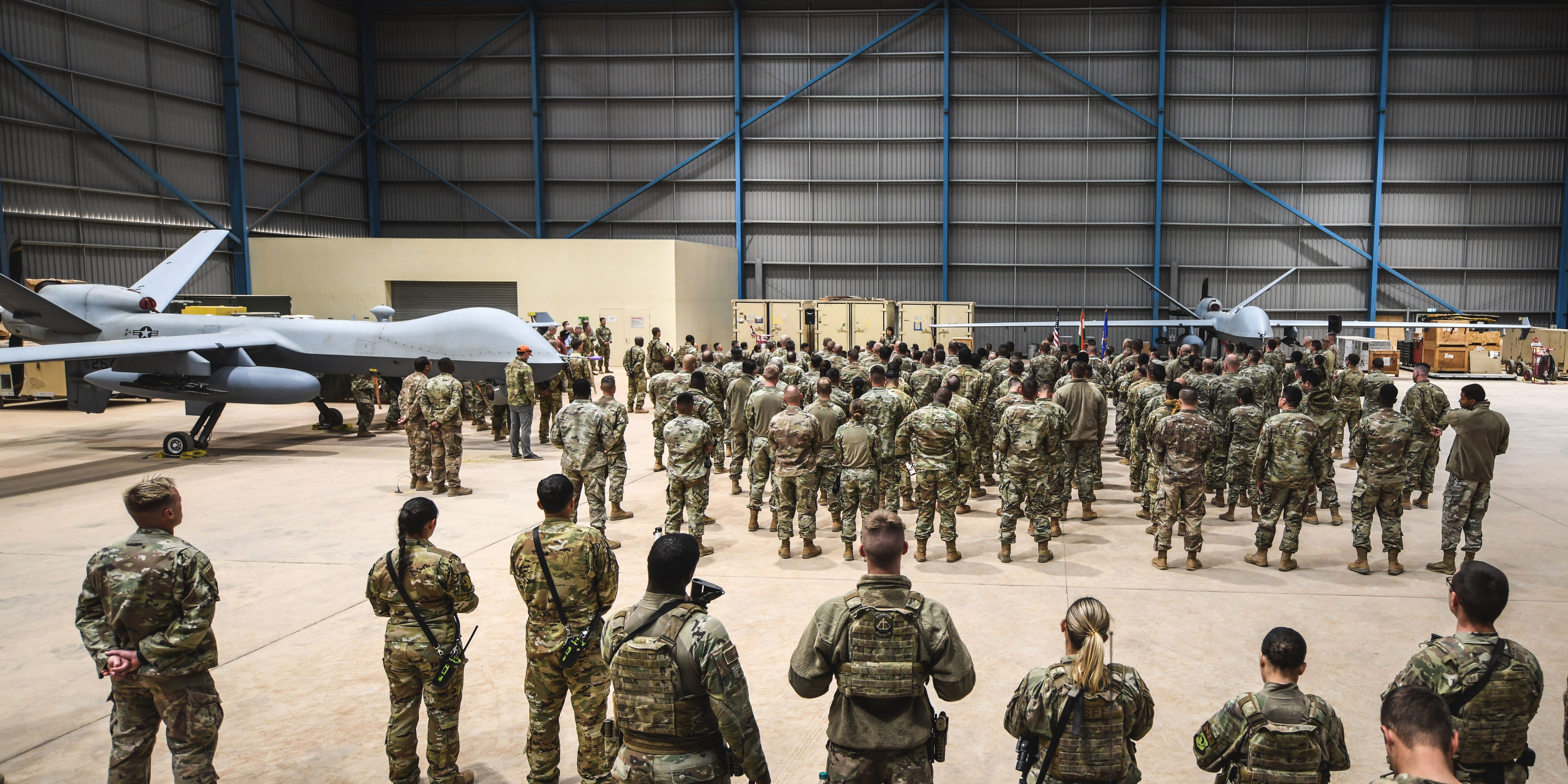 Chief Master Sgt. of the Air Force JoAnne S. Bass speaks to joint service members during a holiday visit at Nigerien Air Base 201, Agadez, Dec. 21, 2021. During her visit to AB 201, Bass addressed the importance of how the U.S. Air Force must develop and build deep institutional understanding of our strategic competitors, and reward and retain Airmen who foster the personal attributes necessary for success. (U.S. Air Force photo by Senior Airman Ericka A. Woolever)