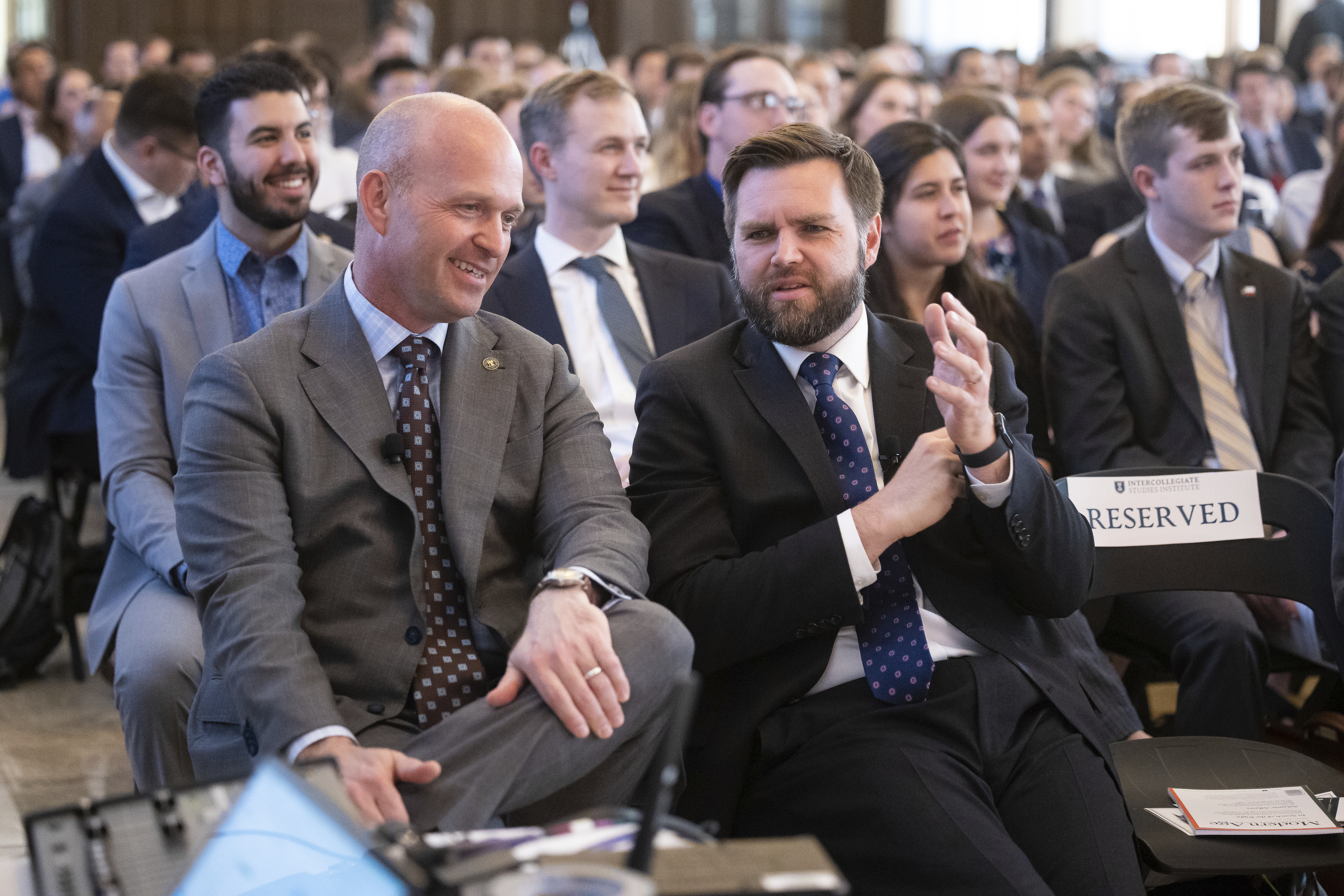 Heritage Foundation President Kevin Roberts and Sen. JD Vance (R-Ohio) converse before taking part in a panel discussion on regime change and the future of liberalism at Catholic University in Washington, D.C., May 17, 2023.