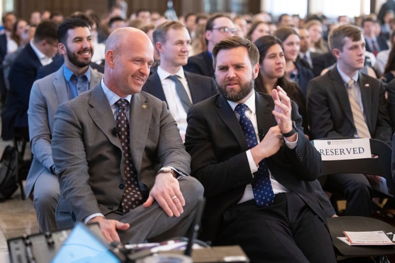 Heritage Foundation President Kevin Roberts and Sen. JD Vance (R-Ohio) converse before taking part in a panel discussion on regime change and the future of liberalism at Catholic University in Washington, D.C., May 17, 2023.