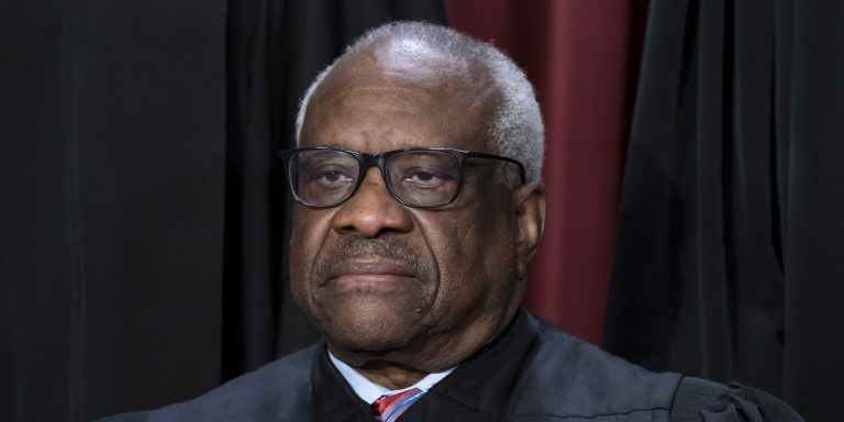 Justice Clarence Thomas during a group portrait at the Supreme Court building in Washington, Oct. 7, 2022.