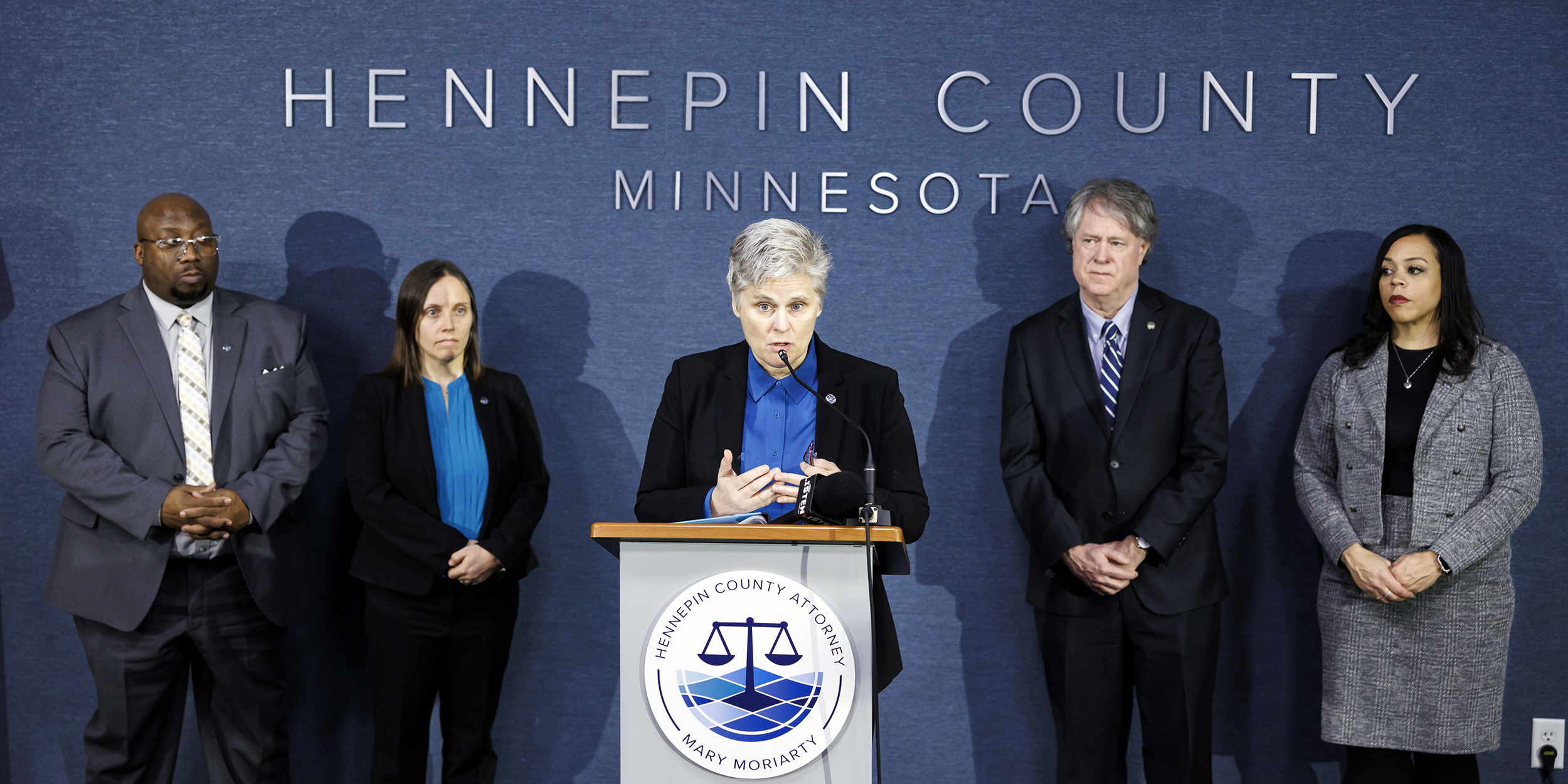 Hennepin County Attorney Mary Moriarty, center, provides an explanation to members of the press regarding the State Patrol killing of Ricky Cobb II at the Hennepin County Government Center in Minneapolis on Wednesday, Jan. 24, 2024. (Kerem Yücel/Minnesota Public Radio via AP)