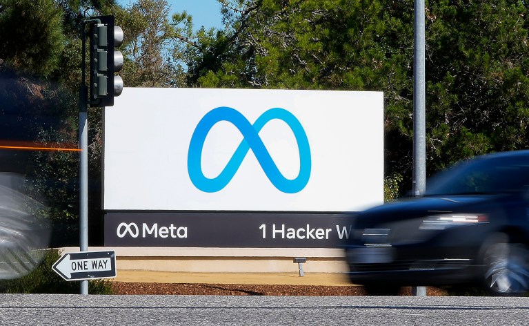 A car passes Facebook's Meta logo on a sign at the company headquarters on Oct. 28, 2021, in Menlo Park, Calif.