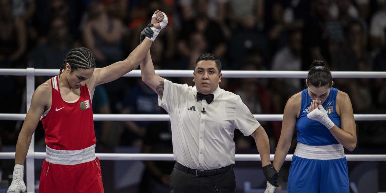 Algeria's Imane Khelif (in red) and Italy's Angela Carini after their match at the 2024 Olympic Games at the North Paris Arena, in Villepinte on August 1, 2024.