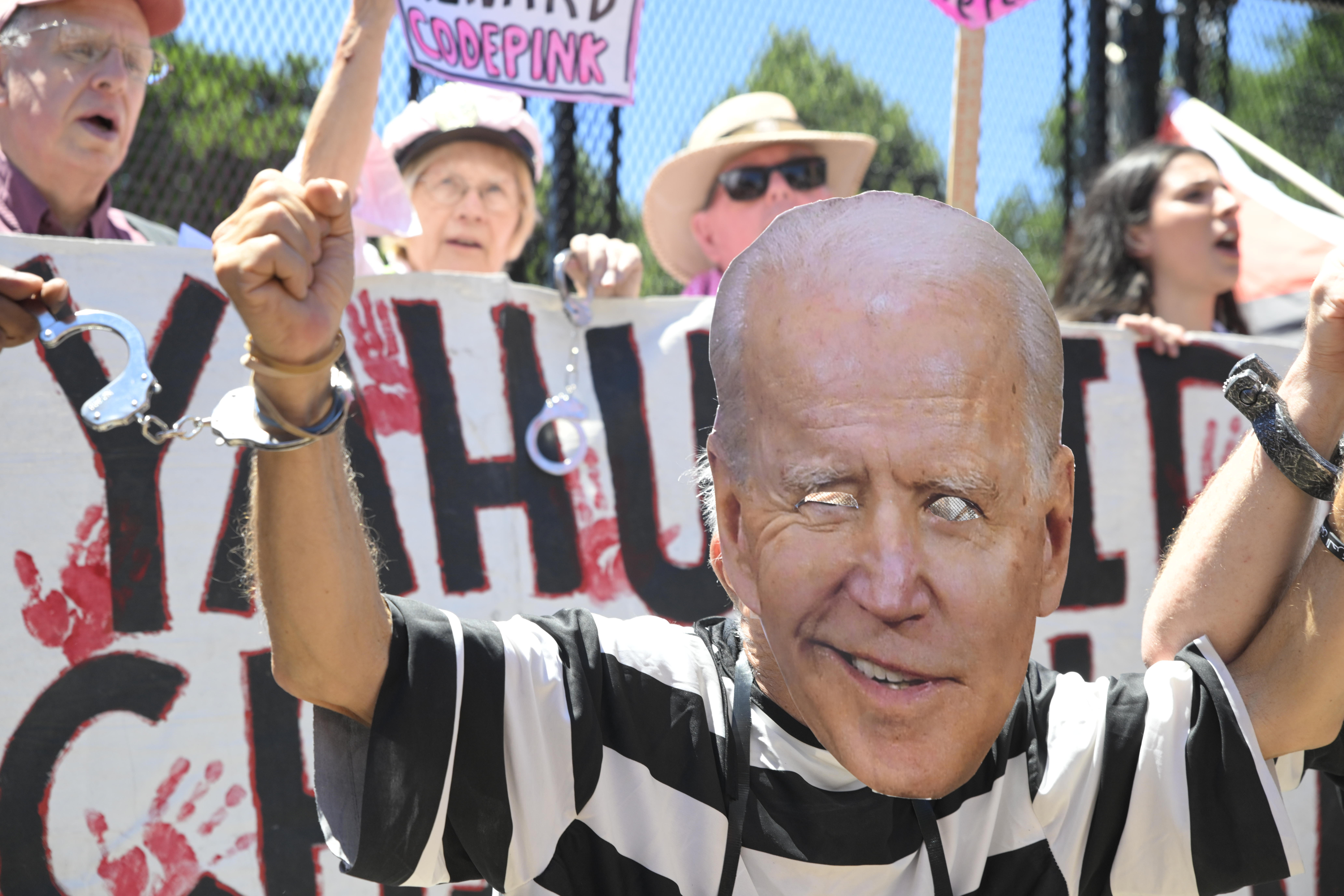 Pro-Palestinian protester wearing a mask depicting U.S. President Joe Biden in front of the White House June 8, 2024.