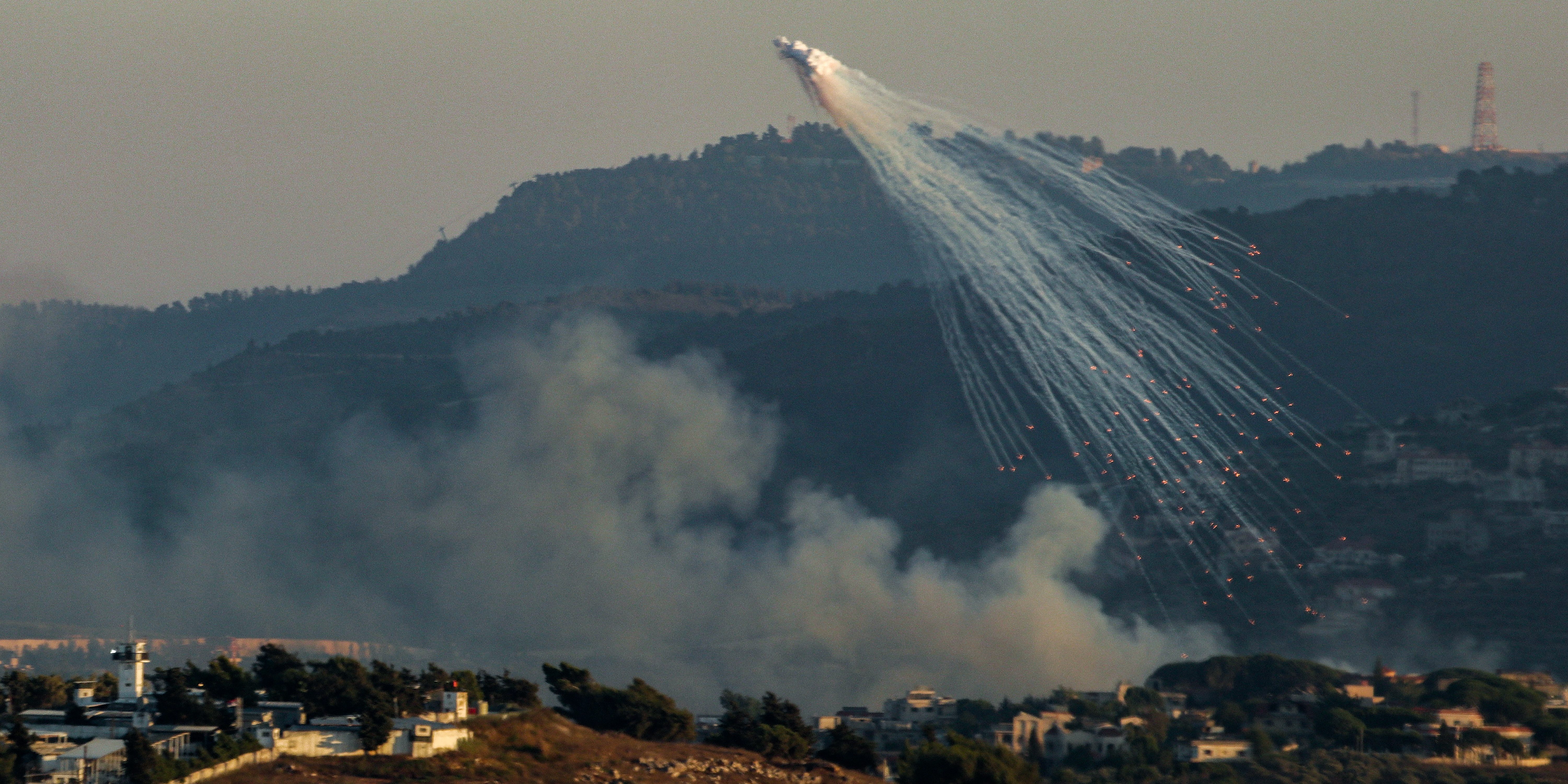 Smoke from Israeli bombardment billows in Kfarkila in southern Lebanon on July 12, 2024.