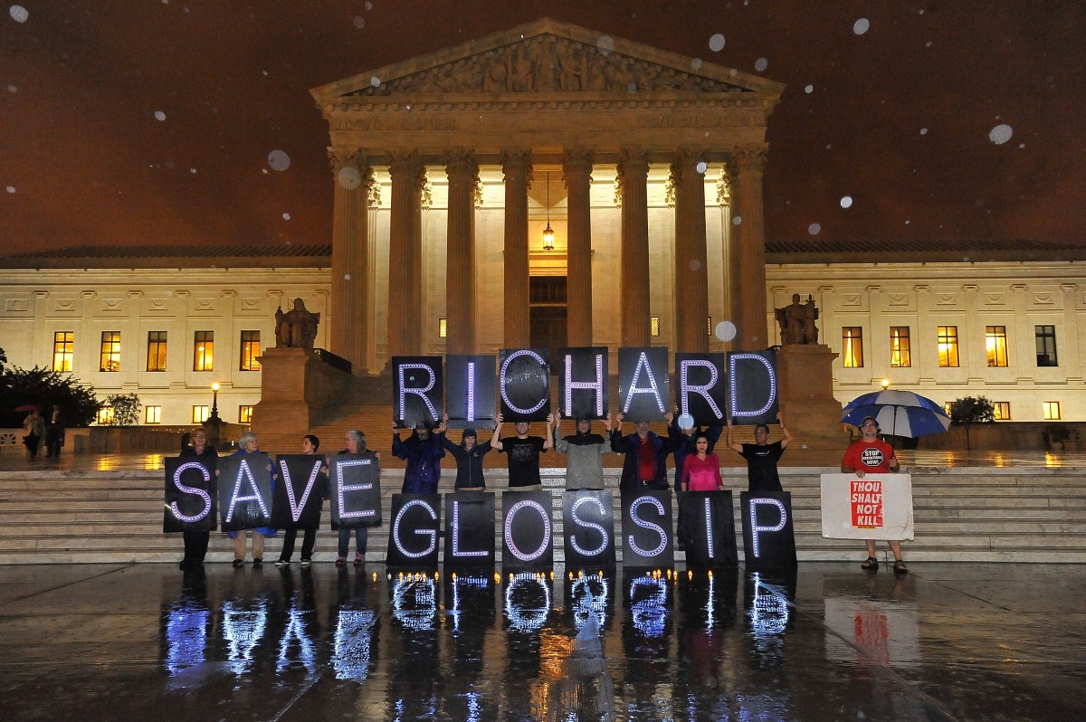 WASHINGTON, DC - SEPTEMBER 29:  Anti-death penalty activists, including members of MoveOn.org and other advocay groups rally outside the U.S. Supreme Court in a final attempt to prevent the execution of Oklahoma inmate Richard Glossip on September 29, 2015 in Washington, DC.  Legal experts, death penalty opponents, and hundreds of thousands of ordinary Americans have fought tirelessly to prevent the execution of Glossip.  (Photo by Larry French/Getty Images for MoveOn.org)